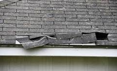 roof repair shingles closeup