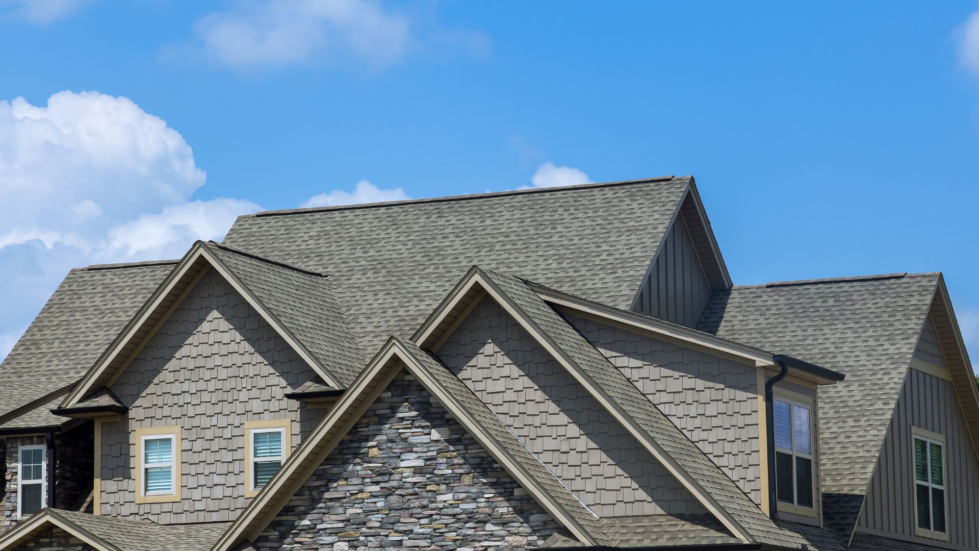 roofing crew installing shingles